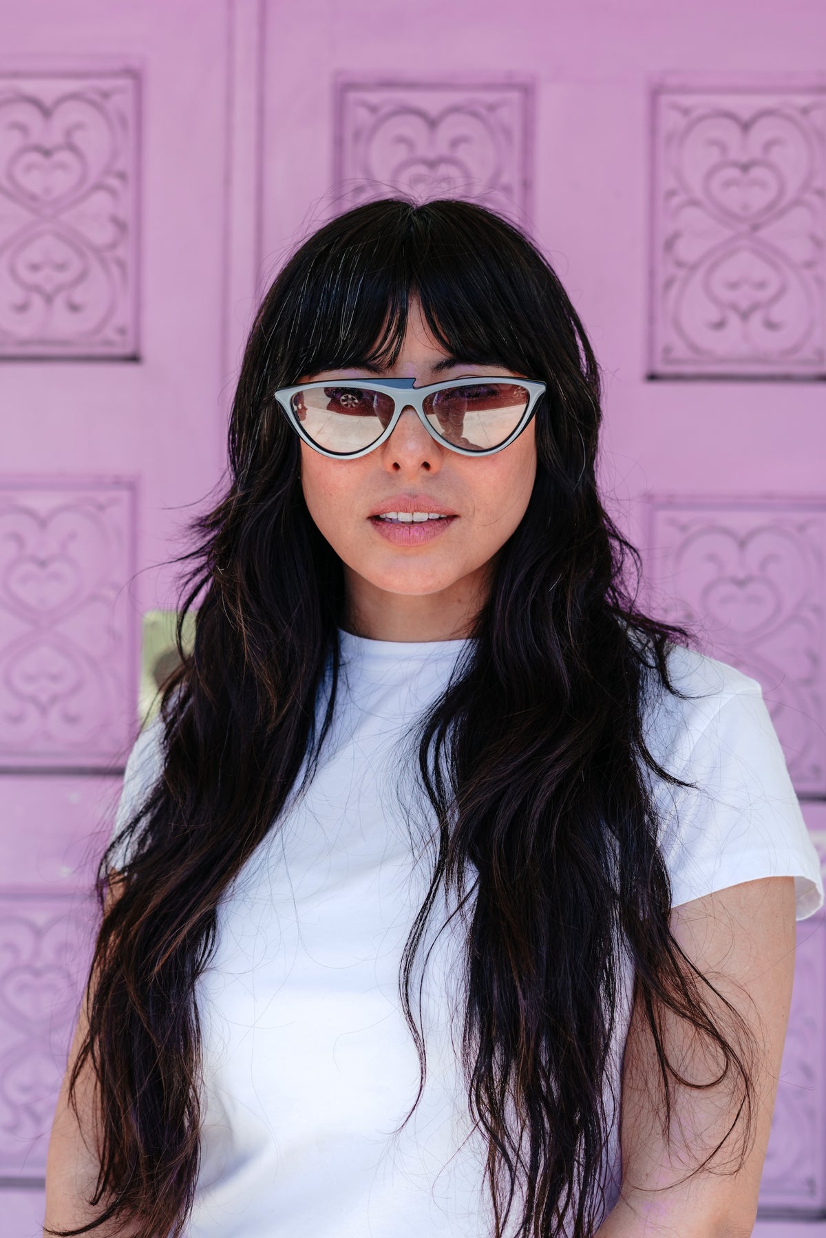 Woman wearing vintage Revival cat-eye glasses