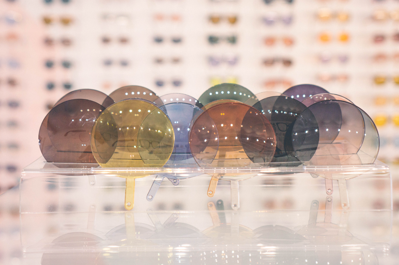 A display of various pastel-colored eyeglass tints. 